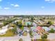 Wide aerial showcasing the neighborhood and waterfront location at 6800 Sanderling Ln, Hudson, FL 34667