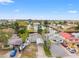 Aerial perspective of canal-side homes and neighborhood at 6800 Sanderling Ln, Hudson, FL 34667