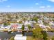 Wide aerial view of canal-front homes and community at 6800 Sanderling Ln, Hudson, FL 34667