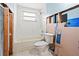 Bathroom with white subway tiles and a shower at 6800 Sanderling Ln, Hudson, FL 34667