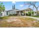 Cozy house with carport and well-maintained yard at 6800 Sanderling Ln, Hudson, FL 34667