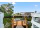 Private wooden dock providing convenient water access at 6800 Sanderling Ln, Hudson, FL 34667