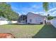 Large backyard with screened porch and playground at 7136 Colony Pointe Dr, Riverview, FL 33578