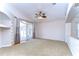 Bright living room featuring sliding doors to a patio at 7136 Colony Pointe Dr, Riverview, FL 33578