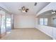 Living room with sliding doors and a view of the backyard at 7136 Colony Pointe Dr, Riverview, FL 33578