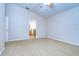 Main bedroom with carpet flooring and ensuite bathroom access at 7136 Colony Pointe Dr, Riverview, FL 33578