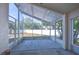 Spacious screened porch overlooking backyard at 7136 Colony Pointe Dr, Riverview, FL 33578