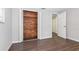 Bright bedroom with wood closet and laminate floors at 7930 Datura Lane Ln, New Port Richey, FL 34653