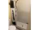 Small shower with a shower curtain and tiled walls at 8328 Clermont St, Tampa, FL 33637