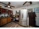 Bright kitchen with stainless steel appliances and ample cabinet space at 8742 Narcissus Ave, Seminole, FL 33777