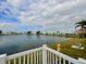 Scenic view of a lake with residential homes in the background at 9920 34Th N Way, Pinellas Park, FL 33782