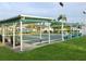 Well-maintained shuffleboard courts under covered areas at 9920 34Th N Way, Pinellas Park, FL 33782