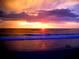 Stunning sunset over the ocean with colorful clouds and calm waves at 100 Waverly Way # 201, Clearwater, FL 33756