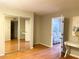 Bright bedroom with mirrored closet and hardwood floors at 100 Waverly Way # 201, Clearwater, FL 33756