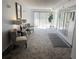 Building lobby with seating area, mailboxes, and modern design at 100 Waverly Way # 201, Clearwater, FL 33756