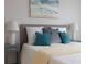 Main bedroom with plush bed and stylish decor at 10355 Paradise Blvd # 212, Treasure Island, FL 33706