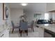 Open concept dining area with kitchen views at 10355 Paradise Blvd # 212, Treasure Island, FL 33706