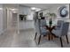 Open concept dining area adjacent to kitchen at 10355 Paradise Blvd # 212, Treasure Island, FL 33706