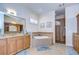 Luxurious bathroom with a soaking tub and double vanity at 10929 Brooksnest Ct, Lithia, FL 33547
