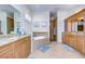 Large bathroom with double vanity, soaking tub, and shower at 10929 Brooksnest Ct, Lithia, FL 33547