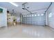 Bright and airy three-car garage; extra storage at 10929 Brooksnest Ct, Lithia, FL 33547