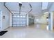 Spacious three-car garage with ample storage at 10929 Brooksnest Ct, Lithia, FL 33547