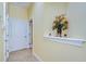 Bright hallway with decorative wall niche at 10929 Brooksnest Ct, Lithia, FL 33547