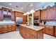 Well-equipped kitchen with granite countertops and stainless steel appliances at 10929 Brooksnest Ct, Lithia, FL 33547