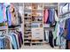 Spacious walk-in closet with ample shelving and hanging space at 10929 Brooksnest Ct, Lithia, FL 33547