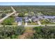 Wide aerial view of canal-front homes and landscape at 13477 Irwin Dr, Port Charlotte, FL 33953
