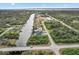 Aerial view of homes along waterway and bridge at 13477 Irwin Dr, Port Charlotte, FL 33953