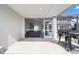 Screened patio with outdoor grill and seating area at 13477 Irwin Dr, Port Charlotte, FL 33953