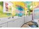 Unique bathroom with colorful mural and double vanity at 13477 Irwin Dr, Port Charlotte, FL 33953