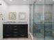 Modern bathroom with blue marble vanity and walk-in shower at 13477 Irwin Dr, Port Charlotte, FL 33953