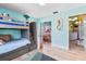 bedroom with bunk beds and ocean-themed decor at 13477 Irwin Dr, Port Charlotte, FL 33953