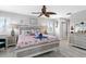 Coastal-themed main bedroom with private access to bathroom at 13477 Irwin Dr, Port Charlotte, FL 33953