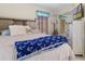 Bedroom with a queen bed and built-in wardrobe at 13477 Irwin Dr, Port Charlotte, FL 33953