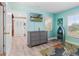 bedroom with dresser and ocean-themed decor at 13477 Irwin Dr, Port Charlotte, FL 33953
