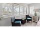 Bedroom sitting area with two wicker chairs and a side table at 13477 Irwin Dr, Port Charlotte, FL 33953