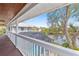 Deck overlooking pool, canal and lush landscape at 13477 Irwin Dr, Port Charlotte, FL 33953
