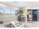Bright living area with water views and workspace at 13477 Irwin Dr, Port Charlotte, FL 33953