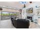 Relaxing living room with fireplace and water views at 13477 Irwin Dr, Port Charlotte, FL 33953