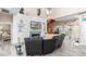 Spacious living room with a fireplace and comfortable seating at 13477 Irwin Dr, Port Charlotte, FL 33953