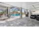 Spacious patio with seating area and pool view at 13477 Irwin Dr, Port Charlotte, FL 33953
