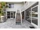 Wooden stairs leading to the patio and pool area at 13477 Irwin Dr, Port Charlotte, FL 33953