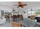 Large covered patio with bar, seating and pool view at 13477 Irwin Dr, Port Charlotte, FL 33953