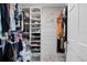 Spacious walk-in closet with ample shelving and hanging space at 13477 Irwin Dr, Port Charlotte, FL 33953