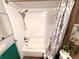 Clean bathroom with a shower/tub combo and updated fixtures at 1400 Tarpon Woods Blvd # H6, Palm Harbor, FL 34685