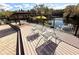 Spacious pool deck with lounge chairs and a gazebo at 1400 Tarpon Woods Blvd # H6, Palm Harbor, FL 34685