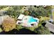 Community pool and spa with lounge area at 1400 Tarpon Woods Blvd # H6, Palm Harbor, FL 34685
